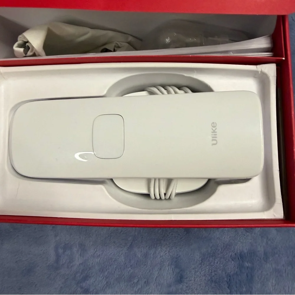 Ulike hair removal White Handheld Device in Original Box used 1 time‎